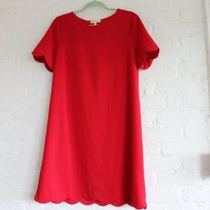 Red dress with scalloped hems